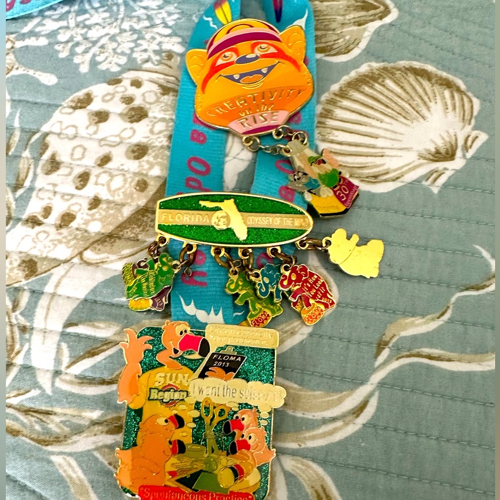 Florida Odysset pin lanyard and 4 collector pins